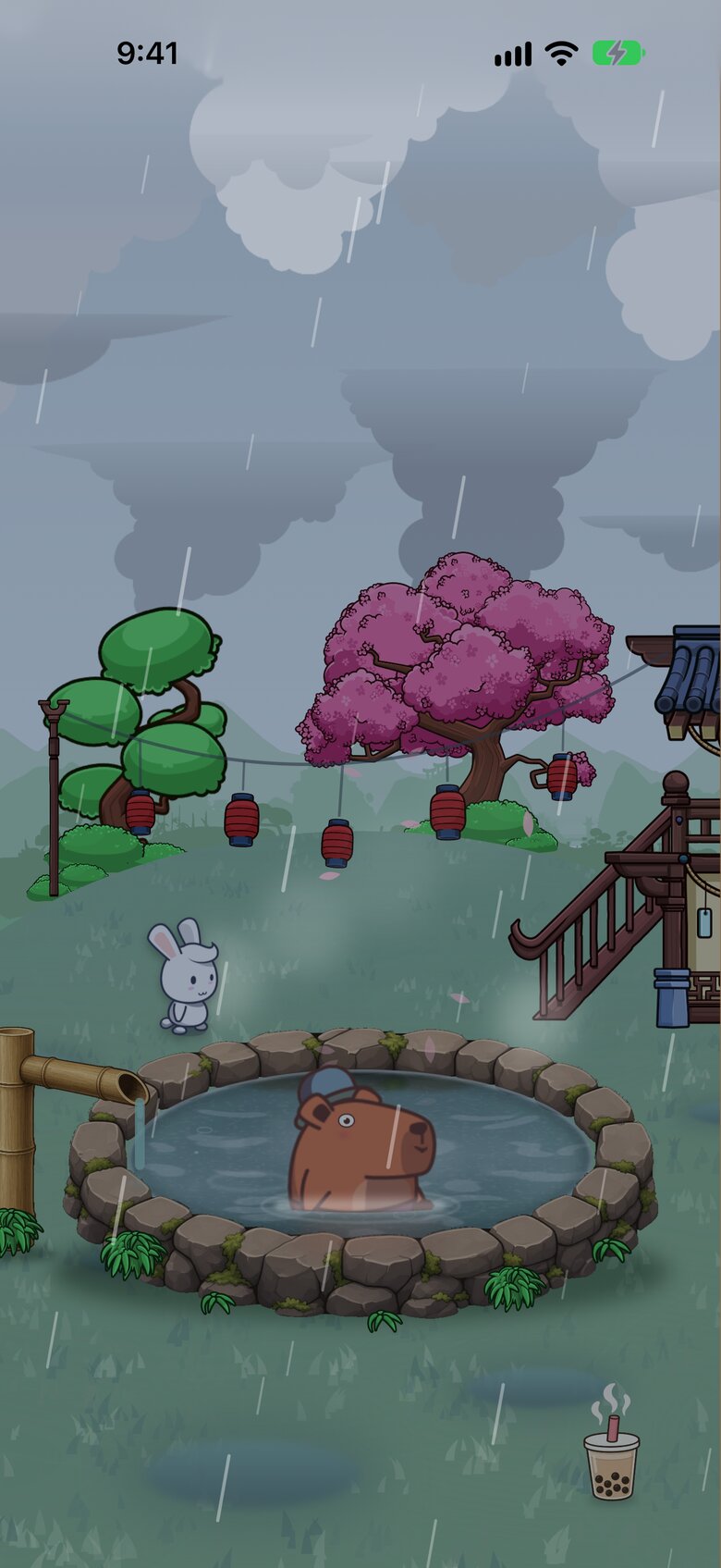The onsen in the rain, with a capybara in the bath.